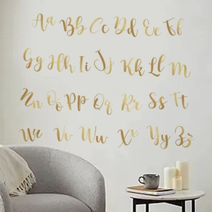 Set di 26 adesivi murali con lettere dell'alfabeto dorate per decorazione del soggiorno
