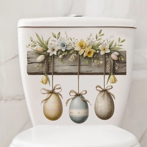 Easter floral egg wall decals with flowers and bows on a white marble background