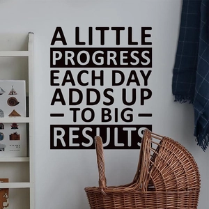 Inspirational black PVC wall sticker with 'A Little Progress Each Day Adds Up To Big Results'