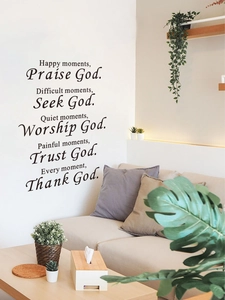 Detail of black PVC inspirational quote wall stickers in a cozy Nordic living room setup