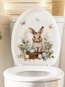 Close-up of Easter bunny and colorful eggs watercolor wall sticker on a toilet lid