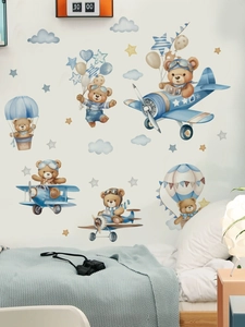 Detailed view of pilot bear wall stickers with airplanes and hot air balloons on wall