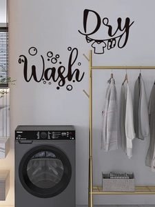 Detail of matte black Wash and Dry vinyl wall decals featuring laundry bubbles and hangers