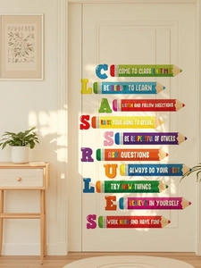 Detail of colorful pencil-shaped class rules wall stickers on a modern white door