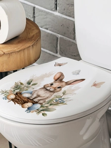 Close-up of Easter wall sticker featuring a cute bunny and colorful eggs on a white lid
