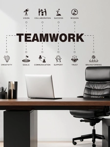 Detail of teamwork office wall stickers featuring black motivational vinyl decals on a white wall
