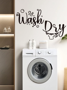 Close-up of black Wash and Dry vinyl wall decals for modern laundry room decoration