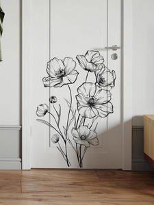 Detailed black line drawing of poppy flowers applied to a modern white interior door