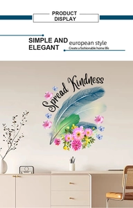 Detail of floral feather wall decal with Spread Kindness text in a cozy home setting