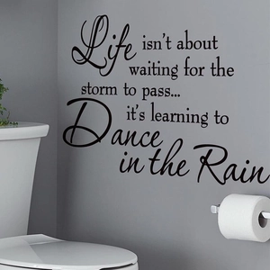Inspirational vinyl wall decal quote Dance in the Rain on gray home interior wall