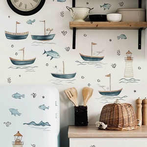 Marine theme wall stickers with sailboat, lighthouse, and fish in hand-drawn style