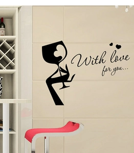 Close-up of black silhouette wall sticker with wine glass and With love for you text