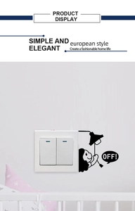 Black silhouette wall decal showing a little girl pulling a lamp cord next to a light switch