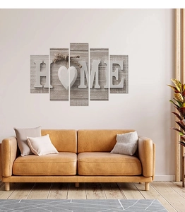 Macro detail of a 5-panel canvas wall art set featuring HOME text on gray wood texture