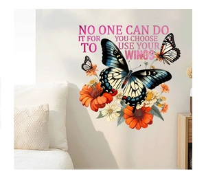 Close-up of pink glitter butterfly wall stickers with flowers in a cozy room decor