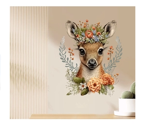 Detail of cartoon deer wall sticker with floral wreath and colorful flowers in a home setting