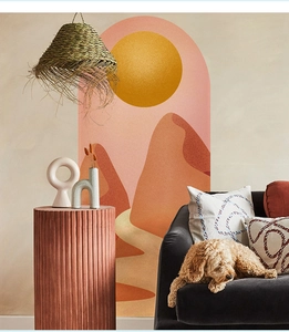 Abstract boho wall sticker featuring sun, desert dunes and mountains in warm terracotta tones