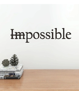 Detailed view of black vinyl wall sticker showing the motivational I'm possible design