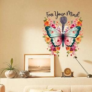 Modern wall sticker featuring girl with butterfly wings and flowers with Free Your Mind text