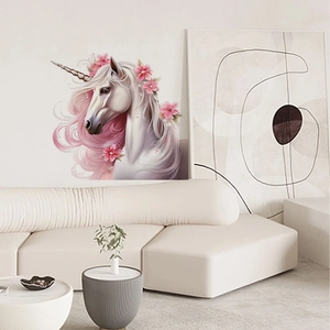 Pink mane unicorn wall sticker on living room wall above a modern beige sofa
