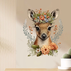 Watercolor deer wall decal with vibrant floral crown on a neutral textured home wall