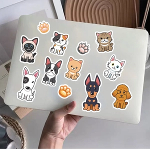 Cartoon animal stickers featuring cats and dogs on a laptop cover for decoration