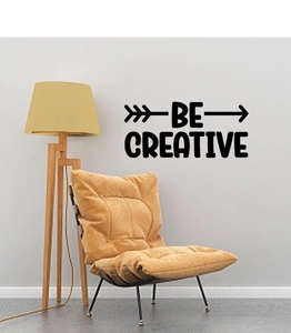 Detail showing 'BE CREATIVE' wall sticker in black artistic font for modern home decor
