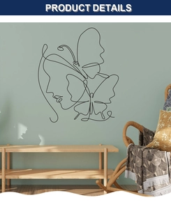 Detail of black line art wall sticker showing a female profile and butterfly design