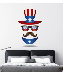 Detail view of 4th of July wall decals featuring Uncle Sam hat and sunglasses on bedroom wall