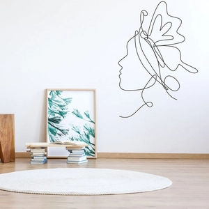 Minimalist one line drawing wall decal featuring a female face and butterfly for home decor