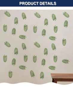 Detail of tropical palm leaf wall stickers showing DIY placement on a light surface