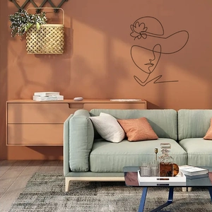 Minimalist black line art wall sticker of a woman in a floral hat for modern home decor