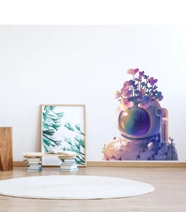 Detail showing an astronaut with purple flowers on a white wall in a minimalist nursery room