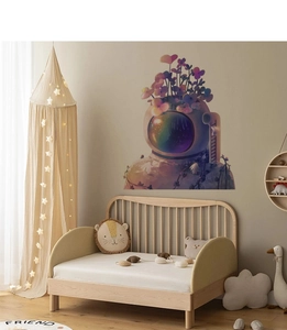 Detail of astronaut wall decal with purple flowers for nursery kids bedroom wall decor