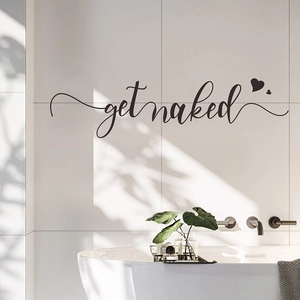 Minimalist Get Naked vinyl wall decal with heart motif for modern bathroom decor