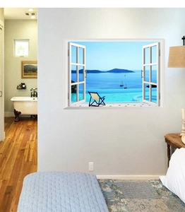 Dettaglio di un adesivo murale 3D con vista mare e finestra su un paesaggio azzurro