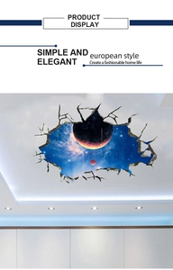 Detail view of 3D cosmic nebula and planet wall stickers applied to a modern ceiling