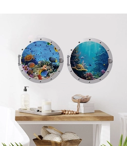 Detail of 3D circular porthole wall stickers with tropical fish and coral reef scene