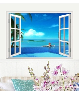 Dettaglio di un adesivo murale 3D effetto finestra con vista su spiaggia tropicale e oceano