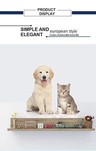 Detail showing wall shelf with decor items and cute puppy and kitten imagery for kids room