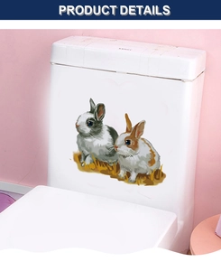 Détail de stickers lapins mignons sur réservoir de toilettes blanc pour la décoration
