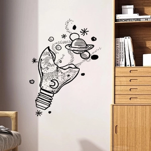 Creative universe in light bulb wall decal featuring Saturn and stars for room decor