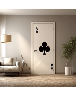 Detail of creative Ace of Clubs poker door sticker in minimalist black for modern home decor