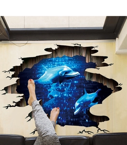 Detailed realistic 3D wall sticker featuring blue dolphins jumping through a broken wall