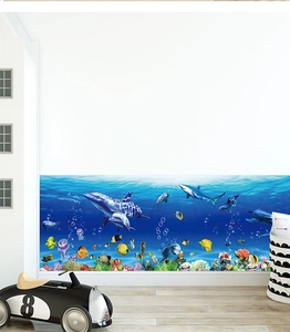 Detailed view of ocean world wall border featuring dolphins, sharks and coral reefs