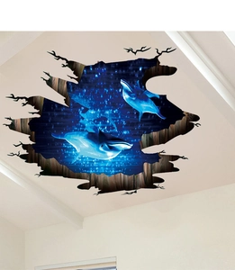 Detail showing 3D ocean dolphin wall sticker with broken wall effect on white ceiling