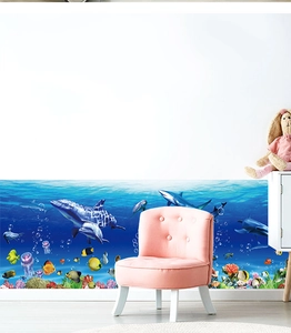 Detail of underwater world wall sticker showing dolphins and tropical fish in kids room
