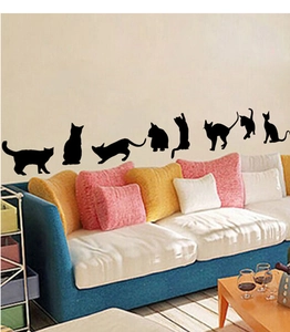 Vue détaillée de huit stickers muraux silhouette de chat noir dans diverses poses