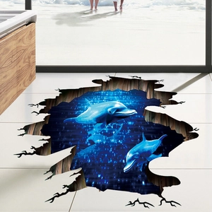 3D ocean floor sticker featuring two dolphins swimming in deep blue water through broken tiles