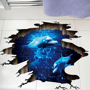 3D ocean floor sticker featuring dolphins jumping from a realistic cracked tile visual effect